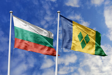 3D illustration. Bulgaria and Saint Vincent and the Grenadines Flag waving in the sky. High detailed waving flag. 3D render. Waving in the sky. Flags fluttered in the cloudy sky.