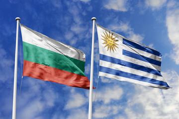 3D illustration. Bulgaria and Uruguay Flag waving in the sky. High detailed waving flag. 3D render. Waving in the sky. Flags fluttered in the cloudy sky.