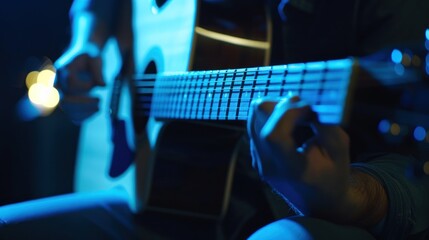 A person is playing a guitar with their fingers