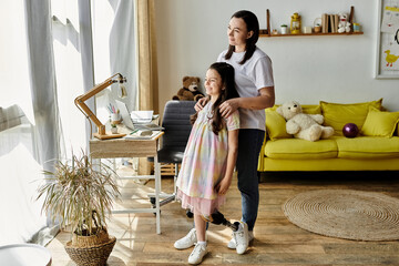 A mother and her daughter with a prosthetic leg are spending quality time at home, enjoying each...