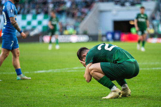 Fototapeta Footballer after missing shoot during soccer match.