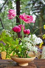 bouquet of garden flowers in a ceramic vase