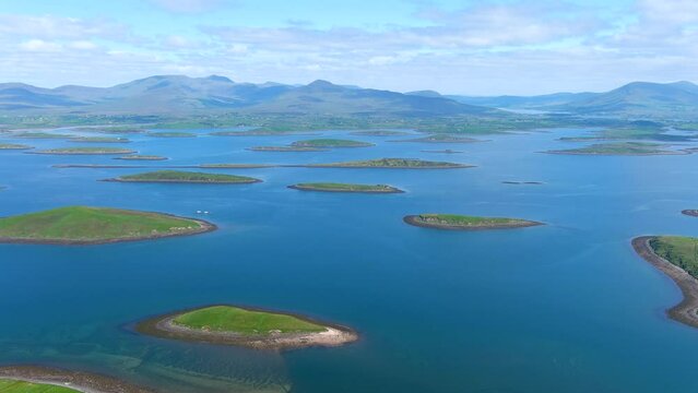 Aerial panorama of Clew Bay's archipelago of islands, partly drowned limestone drumlins formed by glacier. Aka Cuan Modha, one of nature's greatest spectacles when viewed from above. Co. Mayo, Ireland