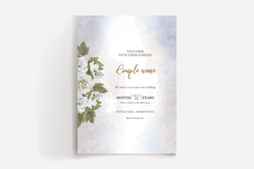 WEDDING INVITATION FRAME WITH FLOWER DECORATIONS AND FRESH LEAVES 