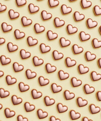 Repetitive flat lay of rows of chocolate rose coloured love hearts on a vibrant yellow background concept 3d render