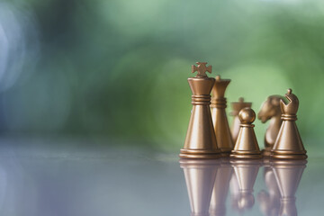 Golden chess figures standing. Leadership, follower, team, commander, competition, business...