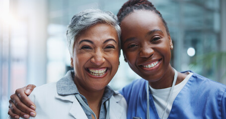Portrait, woman doctor and nurse hug in hospital with smile for healthcare, collaboration or...