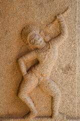 Stone bas-reliefs on the walls around the Temple in Hampi.  Unesco World Heritage Site. The famous tourist destination. Karnataka, India.