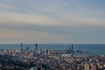 City skyline and harbor. City on the coast. 