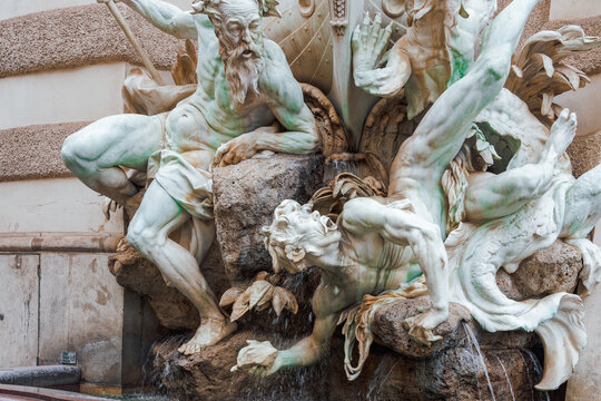Power at Sea fountain (Die Macht zur See) with marble figures encircling a ship, created by Rudolf Weyr in 1897, Hofburg, Vienna, Austria