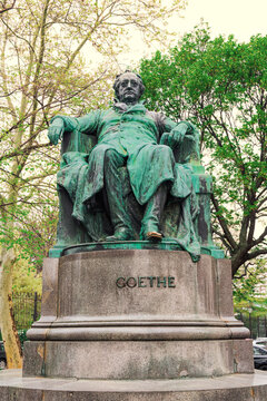 Bronze Goethe statue monument by Edmund Helmer on Goethegasse in Vienna, Austria
