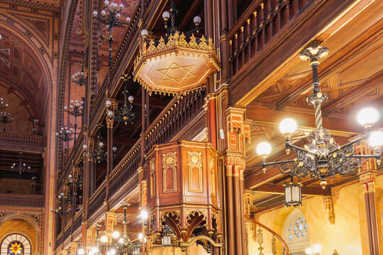 Low angle interior view of illuminated Dohany Street Synagogue (Dohany utcai Zsinagoga) with the Star of David Jewish symbol, Budapest, Hungary