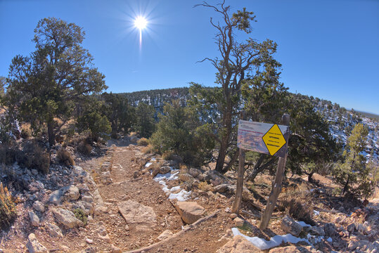 A warning sign at the start of the Hermit Canyon Trail stating that getting to the bottom is optional, but getting back to the top is mandatory, Grand Canyon, Arizona, United States of America