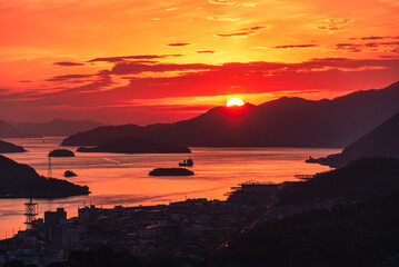 Dramatic red sunset above the bay of Onomichi, Onomichi, Honshu