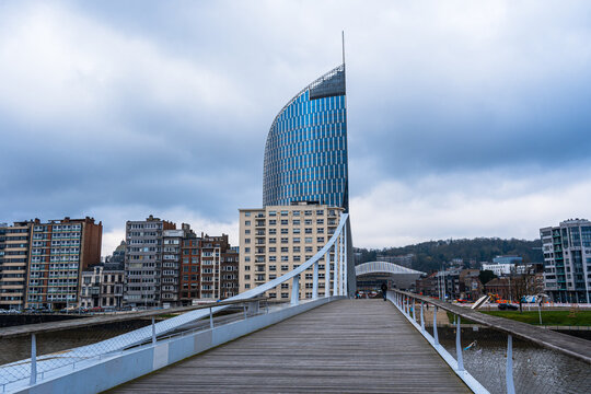 View over the bridge Passerelle La Belle Liegeoise, looking to La Tour des Finances de Liege (Tour Paradis), Liege, Beligum