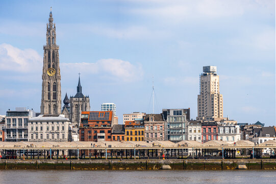 Skyline of city across the River Schelde with Waterfront and Cathedral tower, Antwerp, Belgium