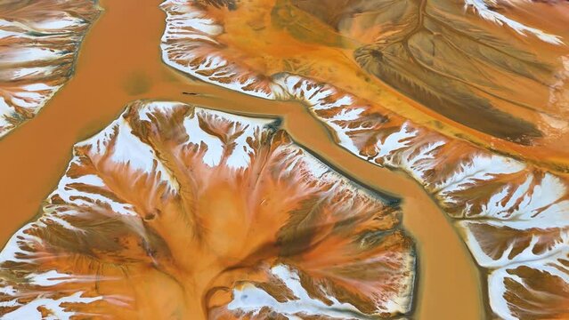 Aerial view of the colored toxic water of Geamana Lake, Romania, Europe
