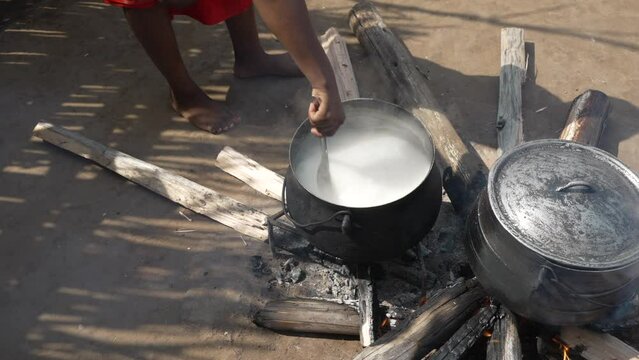 View of camp fire re-enactment at Mantenga Cultural Village, a traditional Eswatini settlement, Malkerns, Eswatini, Africa