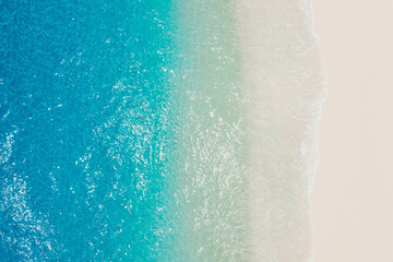 Sandy beach with blue sea. Aerial view of holidays beach on tropical islands