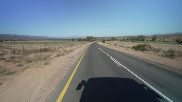 On the road view of road R62 and green mountainous landscape between Zoar and Calitzdorp, Western Cape Province, South Africa, Africa