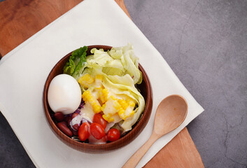 Mixed vegetable salad and boiled eggs, healthy food