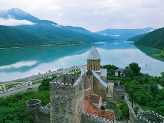 Fototapeta premium ancient Christian monastery in the mountains - aerial drone photo