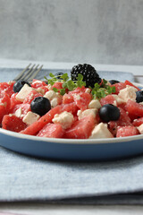 Refreshing Melon and Feta Salad with Arugula Sprouts