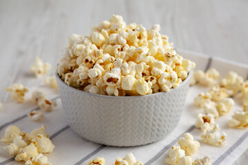 White Buttered Popcorn with Salt in a Bowl, side view.