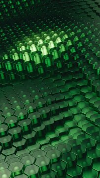 Looped 3d animation of hexagonal grid with wave-like moving up and down elements in it. Green hexagonal grid made from glass with emission light inside each elements