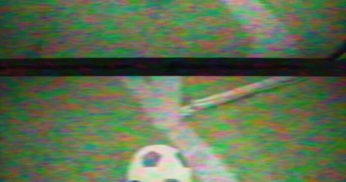 Soccer VHS - Left on the pitch &hellip;  A soccer ball lying on the turf of a soccer field. Damaged VHS tape or faulty analog TV set - VFX