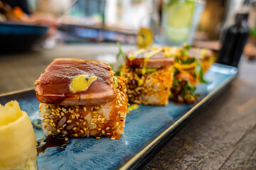Overhead view of platter of sushi rolls