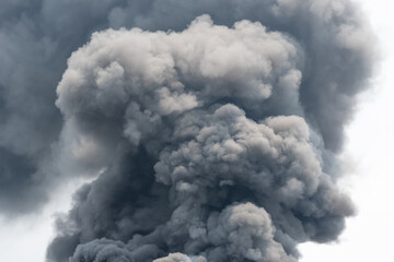 Black smoke caused by burning plastic from cause of fire industrial plant