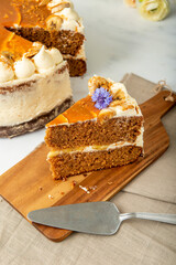 Banana and caramel cake on a table. Beautifully decorated.
