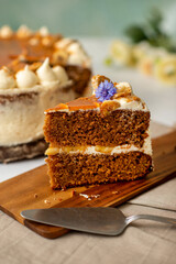 Banana and caramel cake on a table. Beautifully decorated.