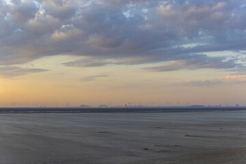 Panoramic picture over the beach of Ouddorp in Holland in the evening during sunset