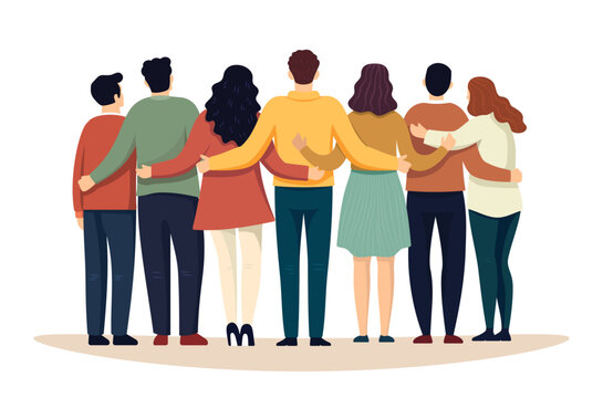 A group of people are standing together, with some of them hugging
