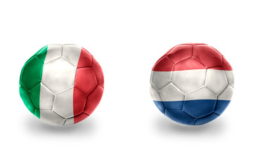 football balls with national flags of netherlands and italy ,soccer teams. on the white background.