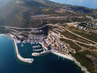 Aerial view of Lustica Bay, Adriatic sea, Montenegro. Top view of buildings, Harbor Marina with...