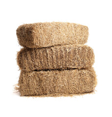Bales of dried straw isolated on white