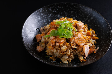 Japanese fried rice yakimeshi isolated in black background