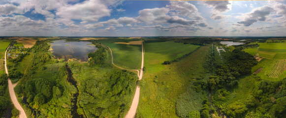 View of the fields and roads from the height of a flying drone. 