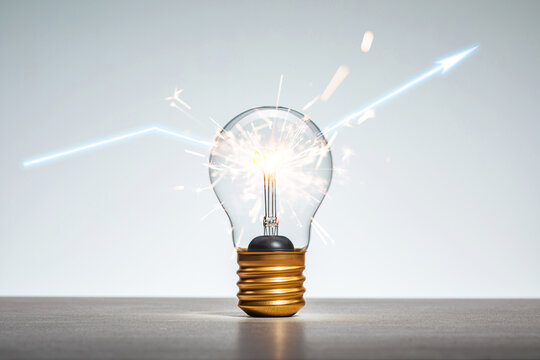 A lightbulb with sparks and light streaks radiating from it, symbolizing a new idea or inspiration with potential for growth and success.