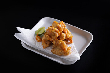 Chicken Karaage Japanese Fried chicken isolated in black background