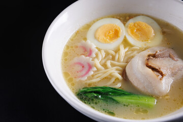 Ramen Japanese noodle isolated in black background