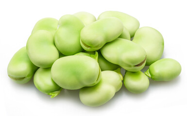 Pile of green young broad beans isolated on white background.