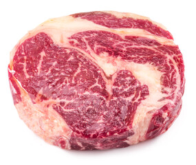 Raw ribeye steak isolated on white background.