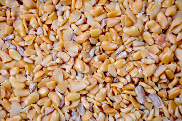 Split fenugreek seeds, also referred to as Methi Kuria, are a type of cracked fenugreek seed commonly used in Indian pickle recipes.