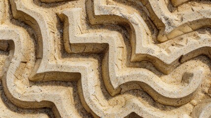 The overlapping patterns of sand converge and diverge resembling a maze or puzzle waiting to be solved
