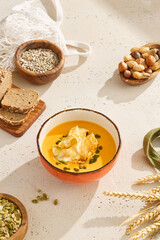 Cozy Autumn Pumpkin Cream Soup with Celery Chips for Comforting Seasonal Supper