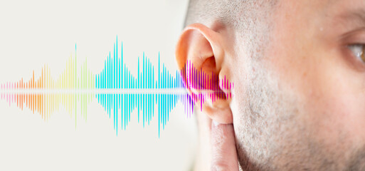 young man ear closeup listening, sound wave, acoustics Auditory System, Hearing Test, Cochlear...